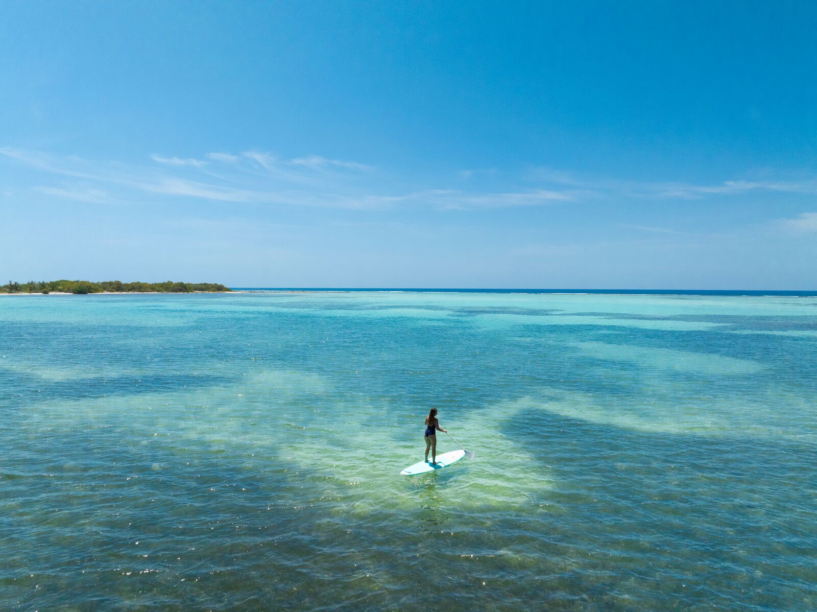 Large-LCM_Paddeboarding_OffTheCoast